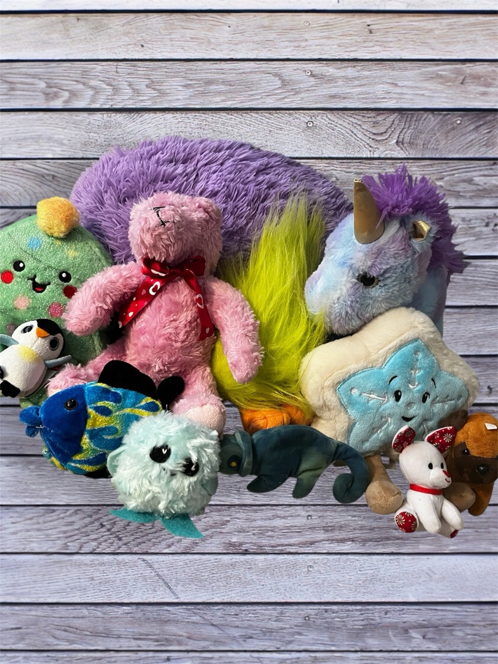 Stuffed animals: unicorn, Christmas, Valentines, dogs, Fuzzbert, pillow, aquatic